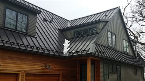 black raised seam metal siding historic house|standing seam metal siding.